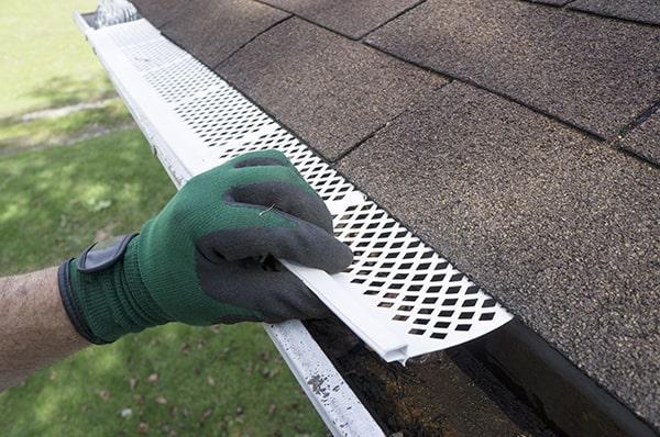 when choosing gutter guards, consider the type of debris in the area, the material and design of the guards, and installation options